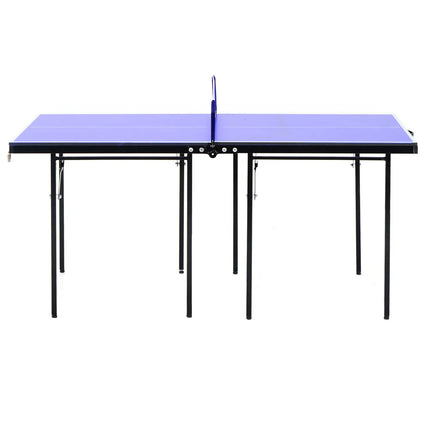 Foldable ping pong table with paddles and net set up indoors